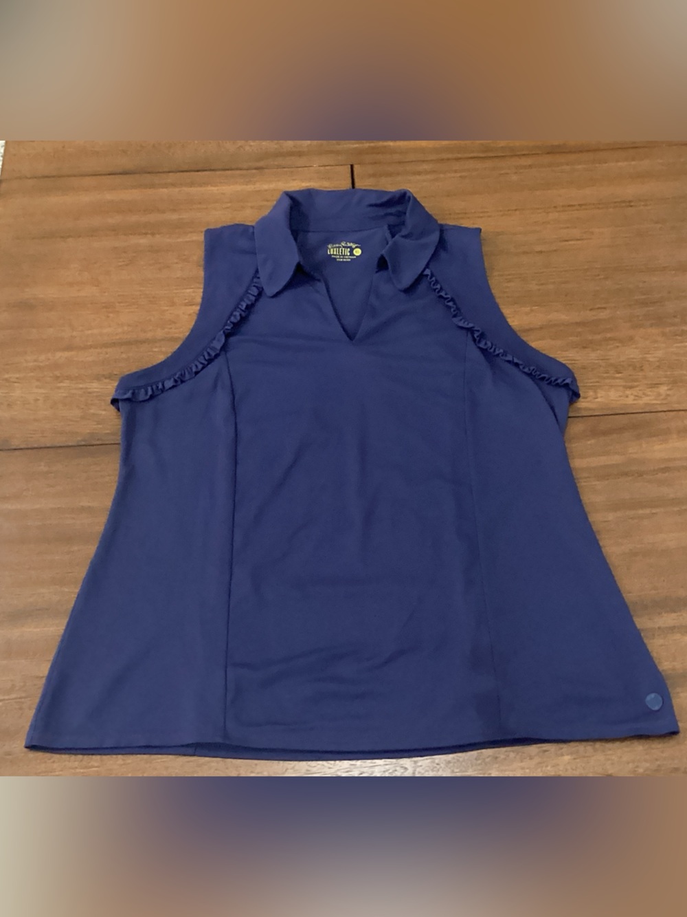 Women's Navy Sleeveless Ruffle-Trim Polo Top